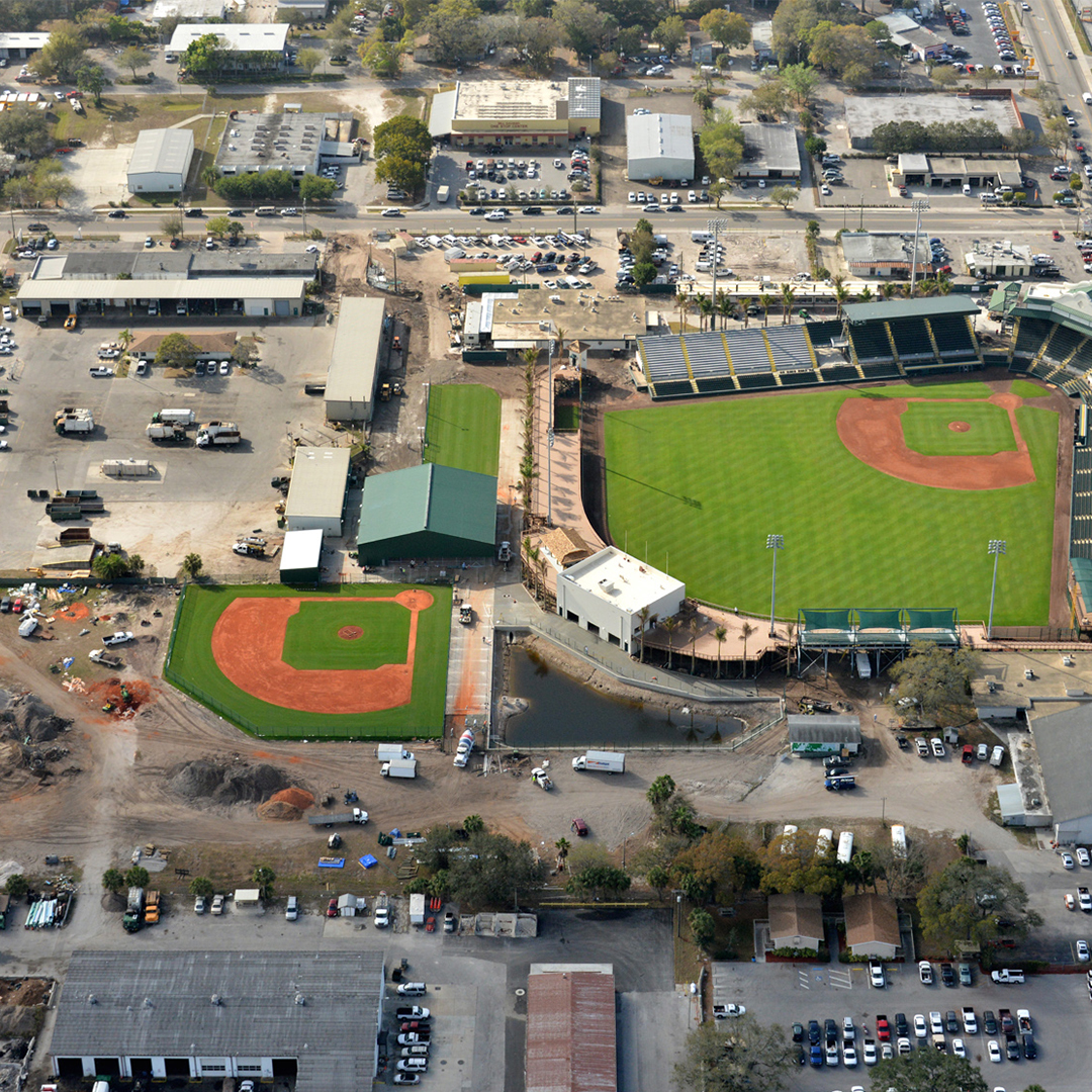 sports complex construction site with turf field installation