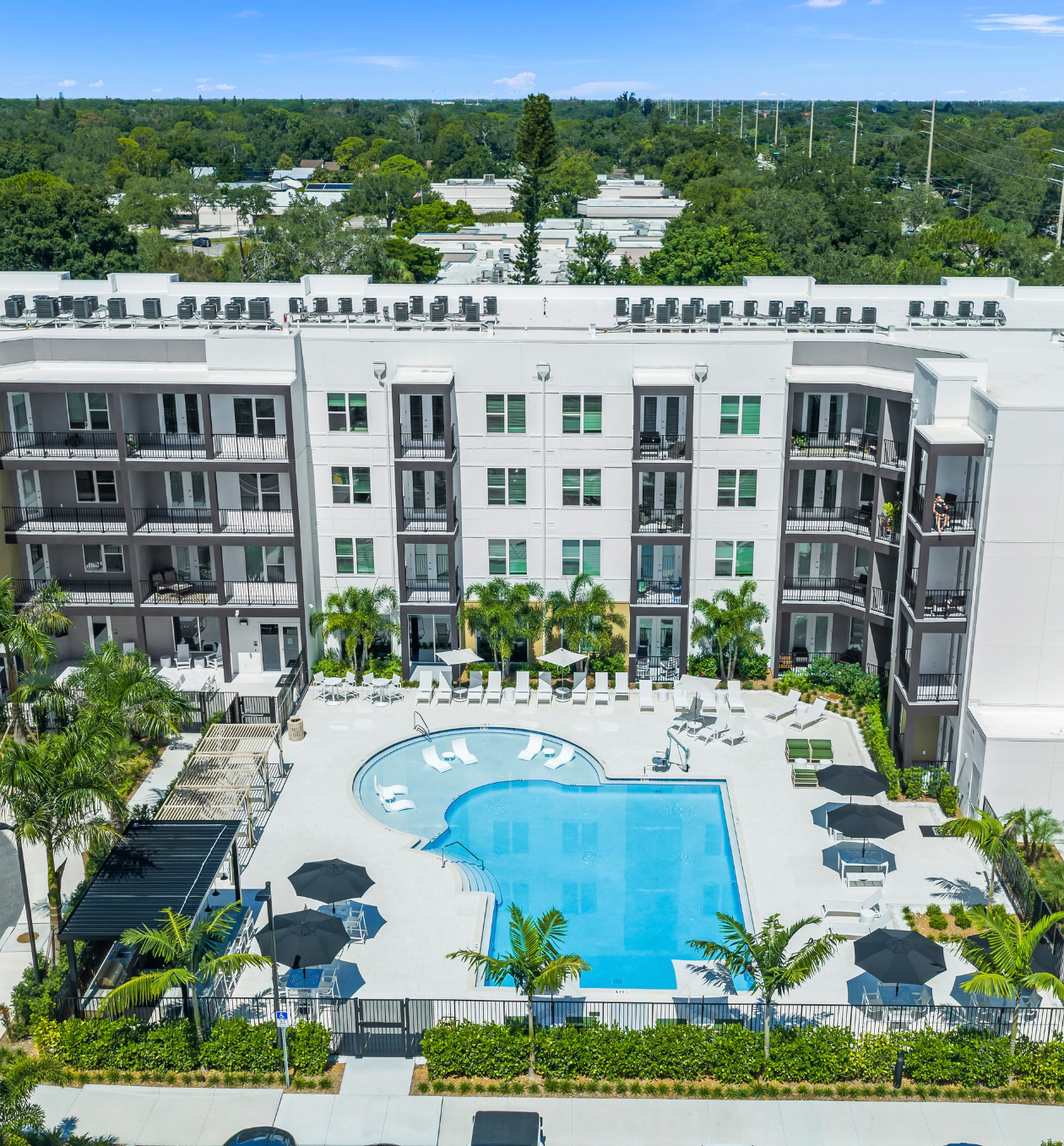 Bahia Vista Pool + Landscaping Apartment building with pool and landscaping