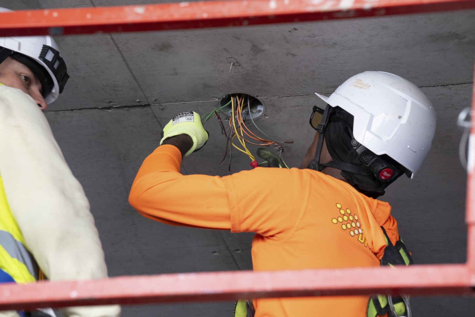 construction team working on structural steel and concrete development
