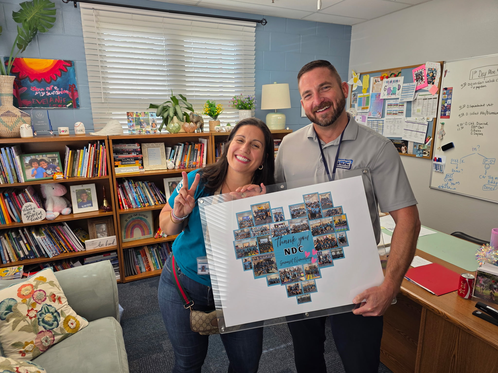 NDC's VP with elementary principal with frame